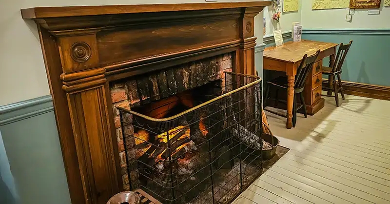 Fireplace and writing table in Toronto's Old Post Office Museum. 