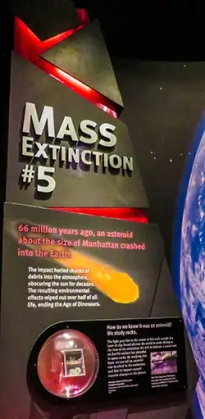 Information sign explaining what caused Mass Extinction #5. 